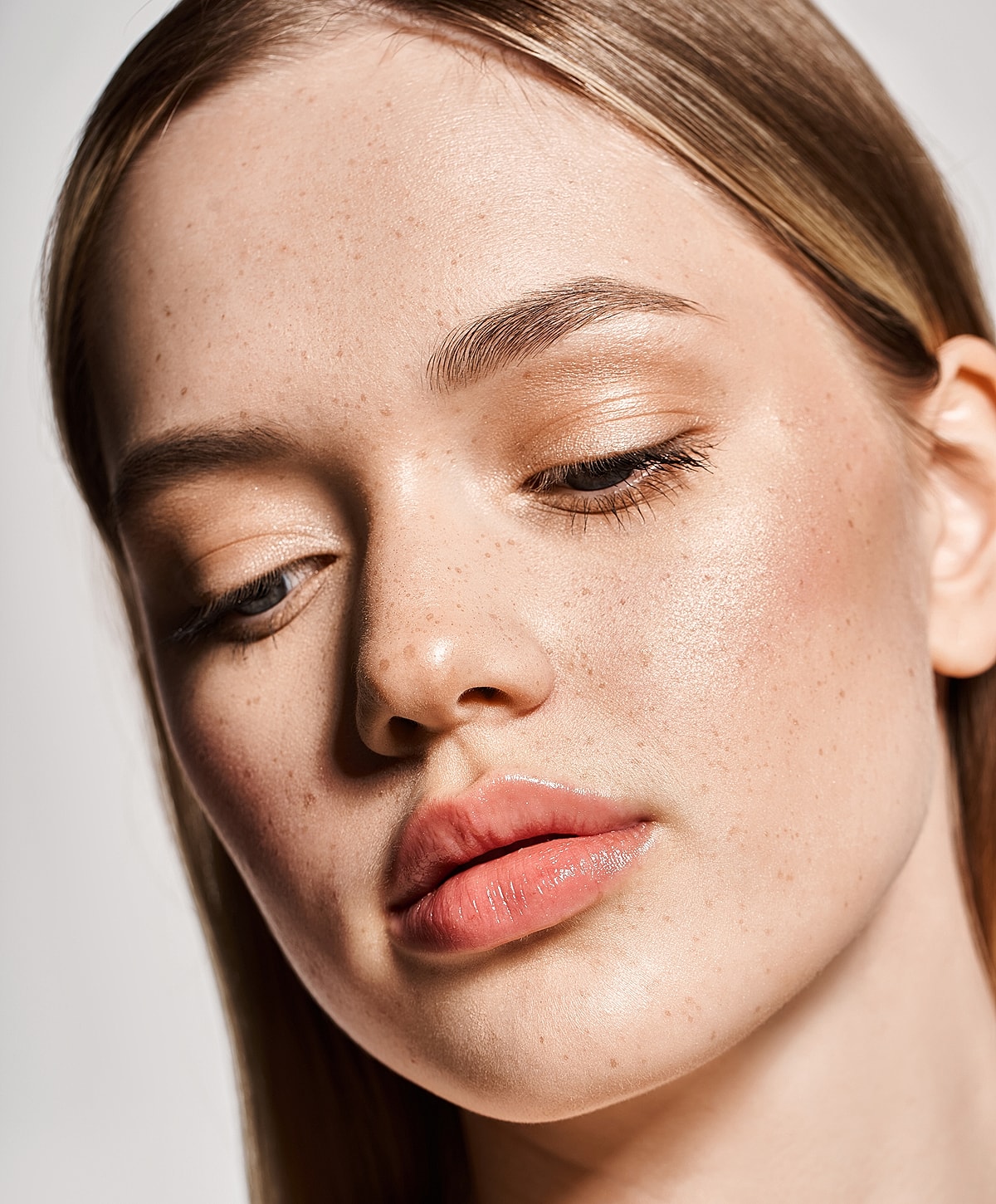 Rancho Santa Margarita Fine lines & wrinkles model with freckles.